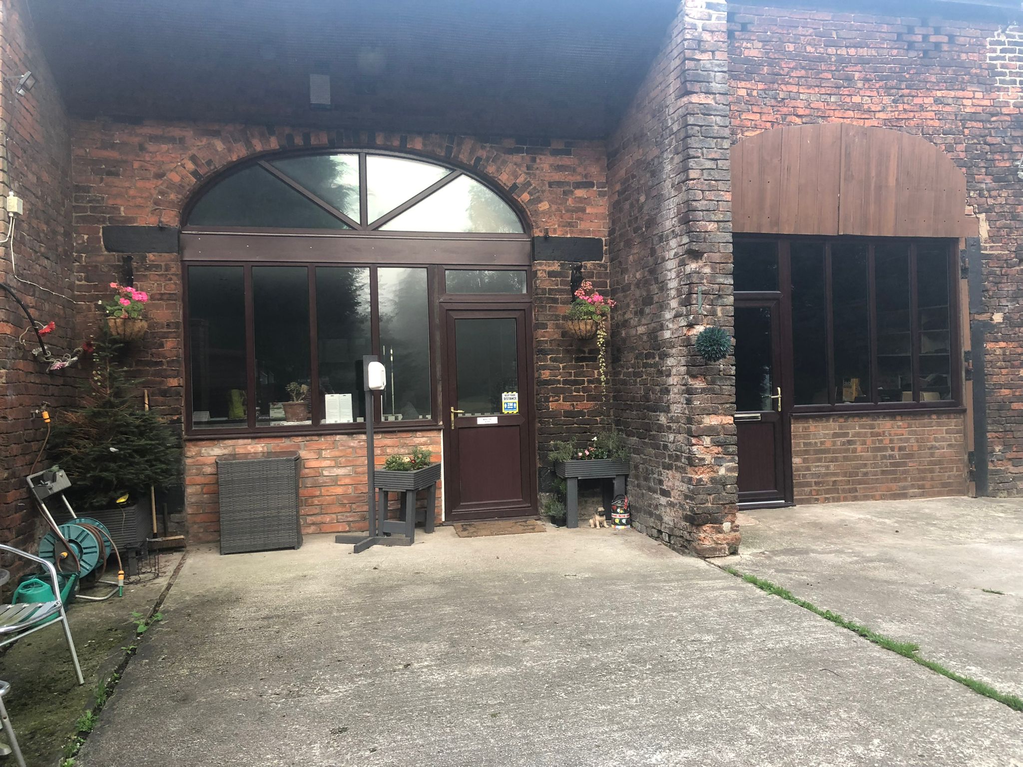 Barking Barn Academy exterior in summer — a welcoming countryside training venue